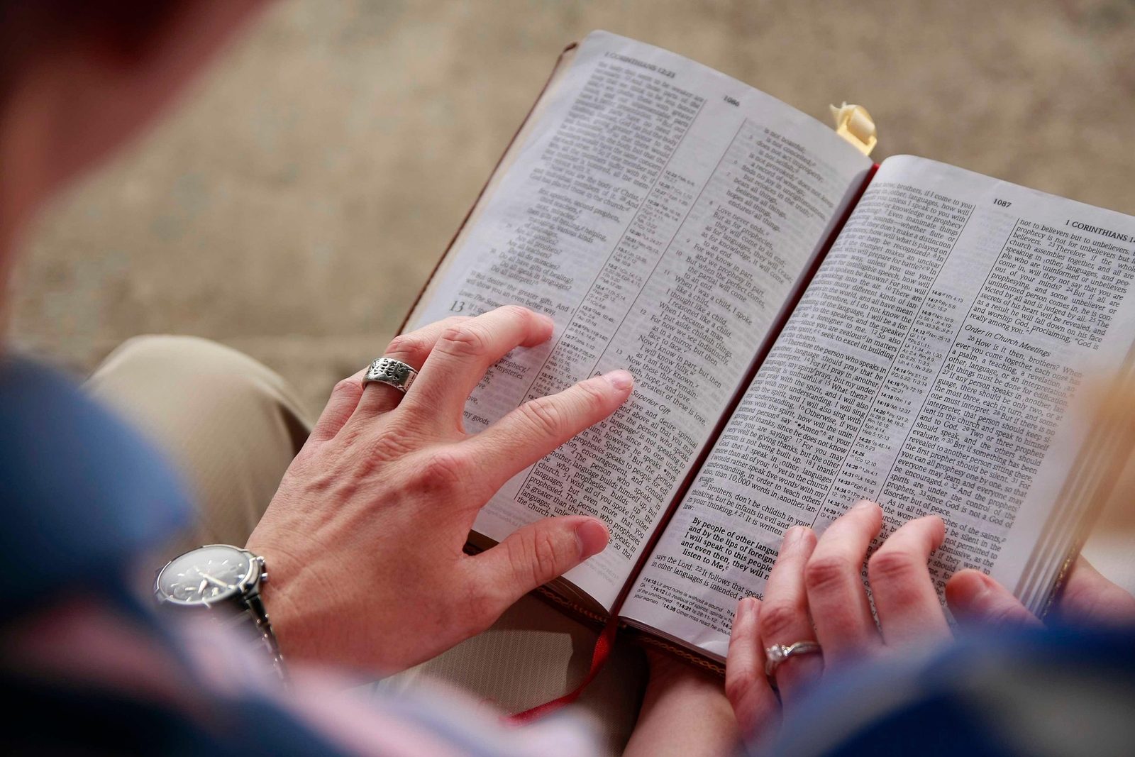 A husband and wife reading the Bible together